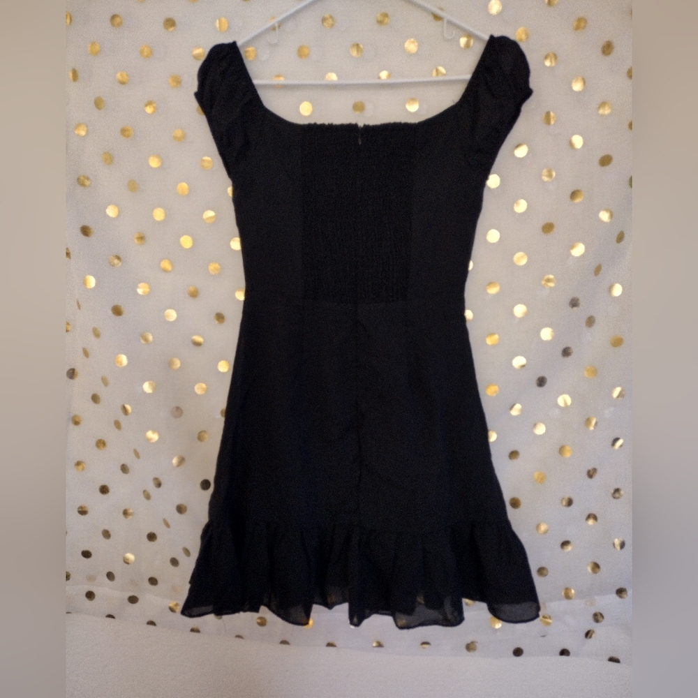 Black mini dress, lined, zipper in back , light weight cotton ,